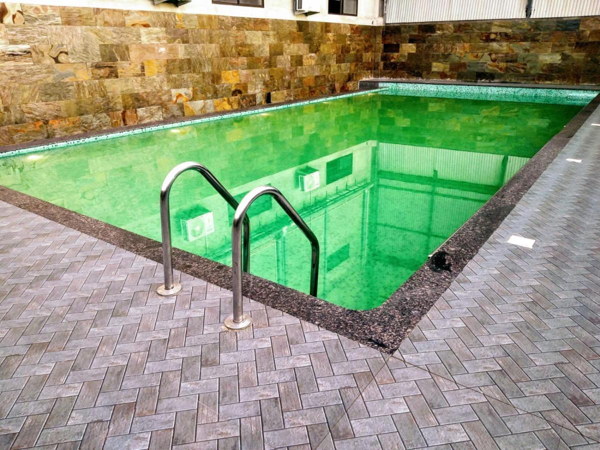 Cap Sports Center Hotell Nīleshwar Eksteriør bilde